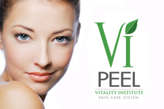 A woman with a beautiful smile and the vitality institute logo.